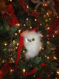 A white owl in a Christmas tree