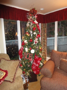 Inspirational words such as "Noel", "Wish", "Believe" and family done this Christmas tree.